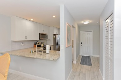 Adorable waterfront villa filled with natural light! This - photo 4