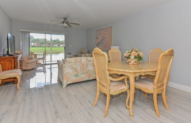 Adorable waterfront villa filled with natural light! This - photo 10