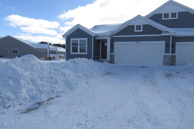 (private lake, pond, creek) Condo For Sale in Grand Haven Michigan