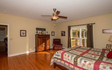 This exceptional creekfront home offers the comforts of