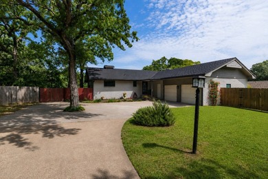 WATERFRONT! Nestled on a private lot along a peaceful canal of - photo 2