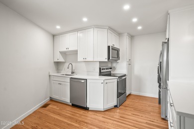 Discover this beautifully updated waterfront house located in - photo 24