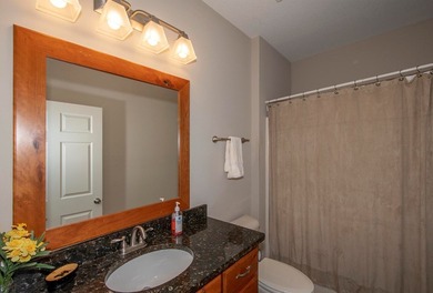 This exceptional creekfront home offers the comforts of