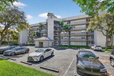 Stunning 2BR/2BA deluxe condo in the heart of SE Boca! Nestled - photo 1