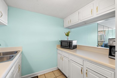 Experience coastal living at its finest in this beautifully