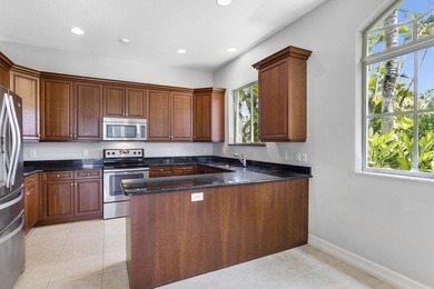 THIS FIRST FLOOR SPACIOUS LOW-MAINTENANCE COACH HOME FEATURES - photo 9