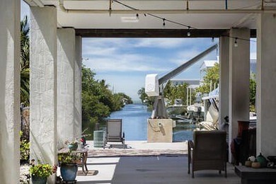 Calling all Boaters! Elevated 3 bed, 2 bath home with 50 FT - photo 12