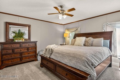 Welcome home to this spacious 4-bedroom, 2-bath manufactured - photo 16