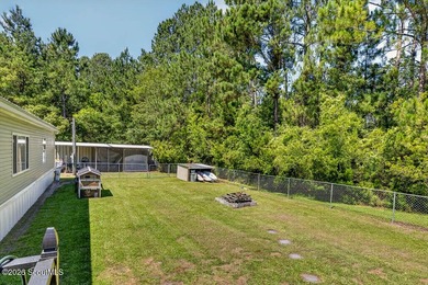 Welcome home to this spacious 4-bedroom, 2-bath manufactured - photo 30