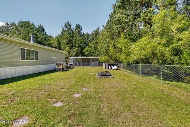 Welcome home to this spacious 4-bedroom, 2-bath manufactured - photo 34