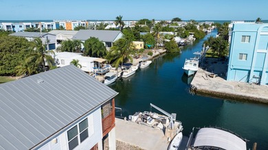 Calling all Boaters! Elevated 3 bed, 2 bath home with 50 FT - photo 34