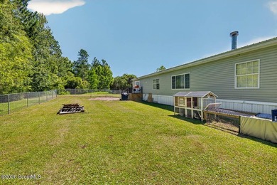 Welcome home to this spacious 4-bedroom, 2-bath manufactured - photo 35