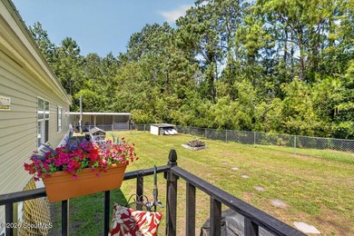 Welcome home to this spacious 4-bedroom, 2-bath manufactured - photo 36