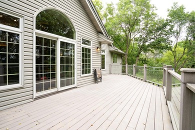 This unique custom-designed home features an open floor plan - photo 12