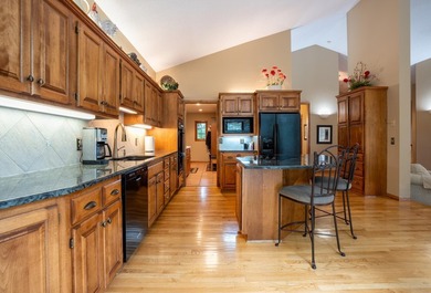 This unique custom-designed home features an open floor plan - photo 15
