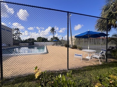 FOR SALE-Second floor condo 2 bedroom 1 bath. AC and Water - photo 23