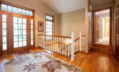 This unique custom-designed home features an open floor plan - photo 32