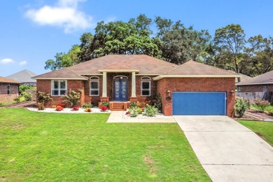 Before you reach the front door at 335 Grove Park Drive, the - photo 1