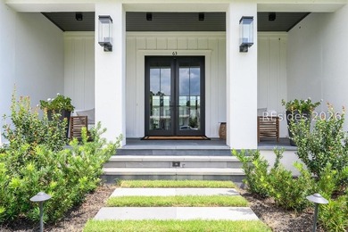 63 Marsh Rabbit Street is a three-bedroom, three-and-a-half bath - photo 3