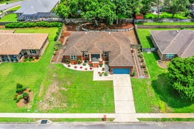 Before you reach the front door at 335 Grove Park Drive, the - photo 10