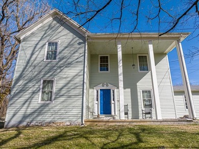 CLASSIC FARMHOUSE MEETS MODERN LIVING in this 3 bedroom 2 bath - photo 2