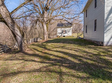 CLASSIC FARMHOUSE MEETS MODERN LIVING in this 3 bedroom 2 bath - photo 3