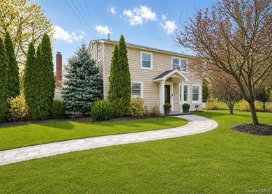 Welcome to this beautifully updated expanded Cape nestled in the - photo 1