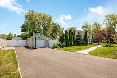 Welcome to this beautifully updated expanded Cape nestled in the - photo 3