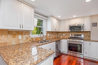 Welcome to this beautifully updated expanded Cape nestled in the - photo 7