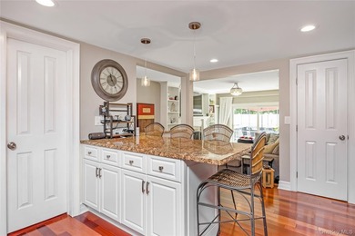 Welcome to this beautifully updated expanded Cape nestled in the - photo 10