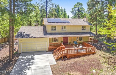 Tucked away on a quiet cul-de-sac, this energy-efficient Country - photo 1