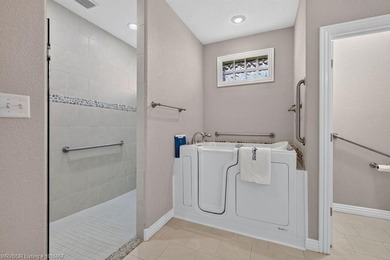 This beautiful 3 bedroom 2 bath garden home located in the - photo 18