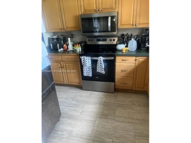 Lake Home Sale Pending in Miami Gardens, Florida