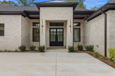 New construction by Dillon Homes in a gated subdivision along - photo 2