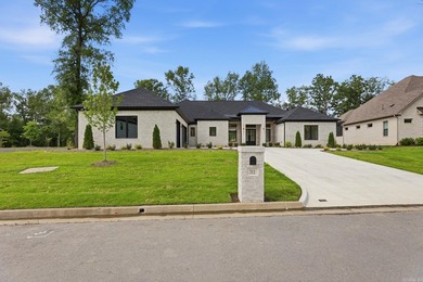 New construction by Dillon Homes in a gated subdivision along - photo 7