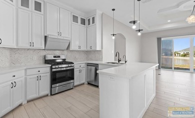 Perfectly located four bedroom, 3 bath custom home located in - photo 4
