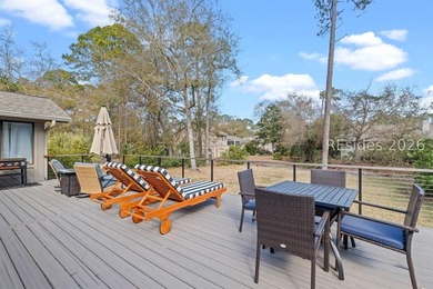 This beautifully updated residence offers laminate wood flooring - photo 2