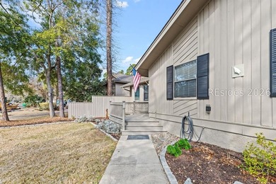 This beautifully updated residence offers laminate wood flooring - photo 4