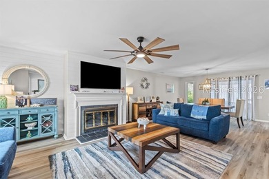 This beautifully updated residence offers laminate wood flooring - photo 7