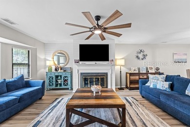 This beautifully updated residence offers laminate wood flooring - photo 8