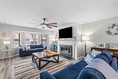 This beautifully updated residence offers laminate wood flooring - photo 9