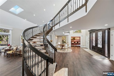 Welcome to this grand 7-bedroom manor located in the prestigious - photo 5