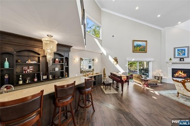 Welcome to this grand 7-bedroom manor located in the prestigious - photo 6