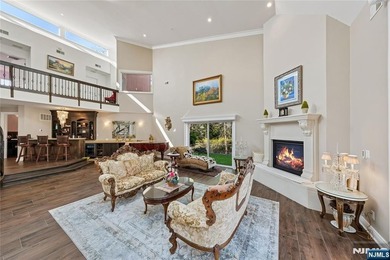 Welcome to this grand 7-bedroom manor located in the prestigious - photo 7
