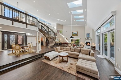 Welcome to this grand 7-bedroom manor located in the prestigious - photo 8