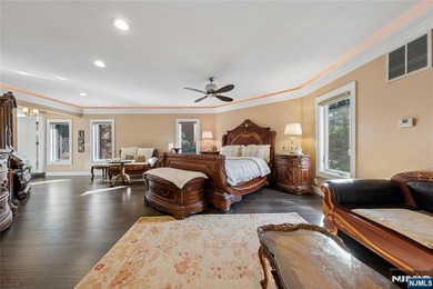 Welcome to this grand 7-bedroom manor located in the prestigious - photo 10