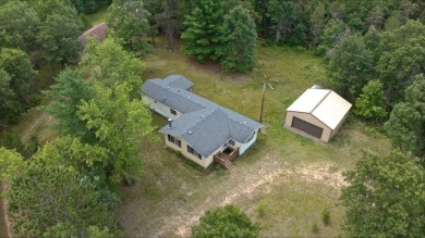 Just 2 miles from Castle Rock Lake! This 4.6-acre single wide - Lake Home For Sale in Necedah, Wisconsin