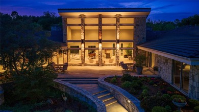 This landmark property, nestled on 35 landscaped acres within - photo 1