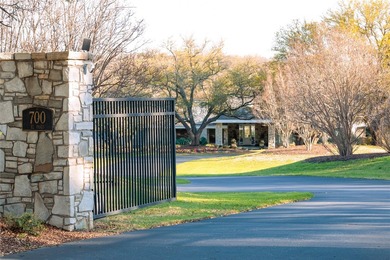 This landmark property, nestled on 35 landscaped acres within - photo 2