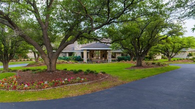 This landmark property, nestled on 35 landscaped acres within - photo 3